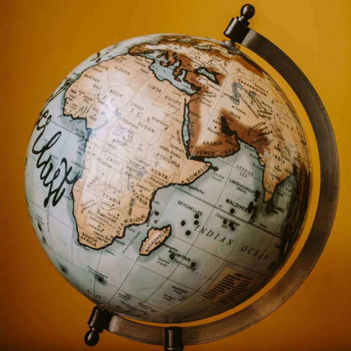 brown and white desk globe